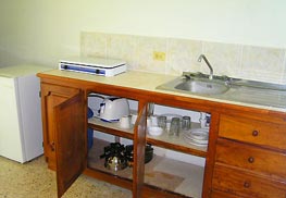 Kitchen in 1br Suite